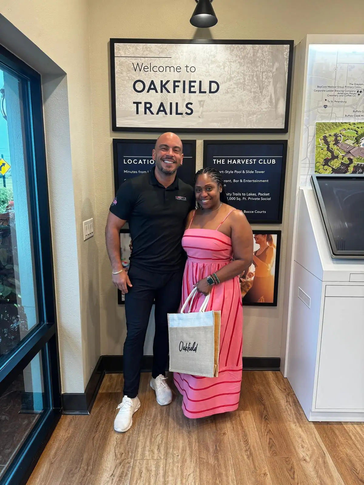 Jose with a client at the Oakfield Trails community welcome center